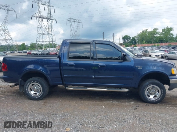 2003 Ford F-150 XLT with VIN 1FTRW08L73KB50541, listed as a IAAI auction lot 42740941 with 181,828 mi miles and . Bid and sale history available at DreamBid. Image 14.