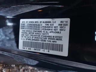 2014 Honda Odyssey Touring with VIN 5FNRL5H94EB110590, listed as a IAAI auction lot 42092929 with 242,338 mi miles and . Bid and sale history available at DreamBid. Image 9.