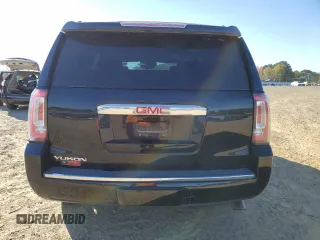 2018 GMC Yukon Denali with VIN 1GKS2CKJ3JR404177, listed as a Copart auction lot 82577354 with 129,744 mi miles and Salvage Title. Bid and sale history available at carsss.com. Image 6.