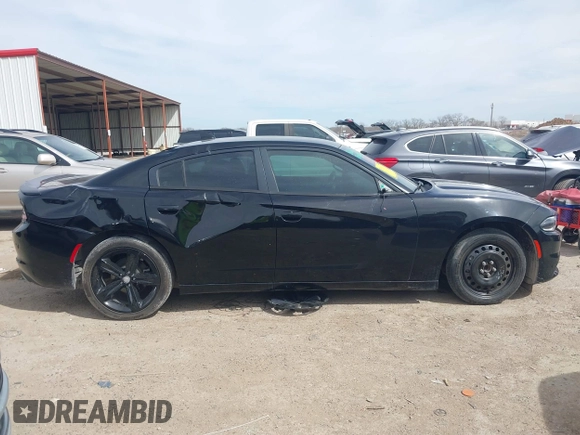 2015 Dodge Charger SXT z VIN 2C3CDXHG7FH777845, wystawiony jako IAAI lot #41791185 z przebiegiem 109 978 mil mil oraz . Historia ofert i sprzedaży dostępna na DreamBid. Obrazek 13.