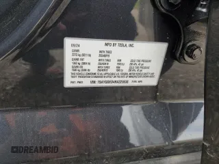 2024 Tesla Model Y с VIN 7SAYGDED4RA329638, выставлен на аукционе Copart как лот 54562525 с пробегом 8 606 миль миль и Списание • Salvage title. История ставок и продаж доступна на DreamBid. Изображение 12.