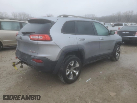 2014 Jeep Cherokee Trailhawk with VIN 1C4PJMBS1EW240177, listed as a Copart auction lot 43321715 with 212,339 mi miles and Salvage title. Bid and sale history available at DreamBid. Image 3.