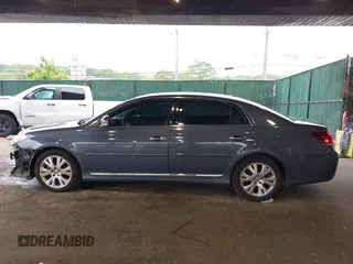 2012 Toyota Avalon z VIN 4T1BK3DB5CU457105, wystawiony jako IAAI lot #42375828 z przebiegiem 121 961 mil mil oraz . Historia ofert i sprzedaży dostępna na DreamBid. Obrazek 14.