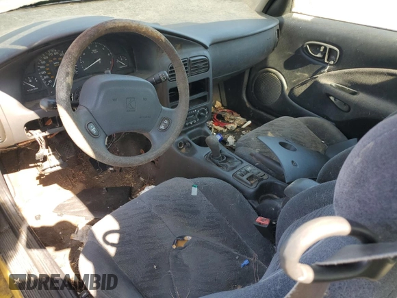 2001 Saturn SC z VIN 1G8ZR12781Z311096, wystawiony jako Copart lot #60574014 z przebiegiem Nie podano mil oraz Tytuł czysty. Historia ofert i sprzedaży dostępna na DreamBid. Obrazek 8.