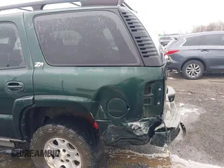 2004 Chevrolet Tahoe Z71 z VIN 1GNEK13Z84R118371, wystawiony jako IAAI lot #41535389 z przebiegiem 255 815 mil mil oraz . Historia ofert i sprzedaży dostępna na DreamBid. Obrazek 17.