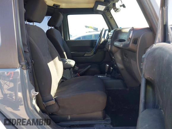 2014 Jeep Wrangler Sport with VIN 1C4AJWAGXEL177449, listed as a IAAI auction lot 41741519 with 117,056 mi miles and . Bid and sale history available at carsss.com. Image 5.