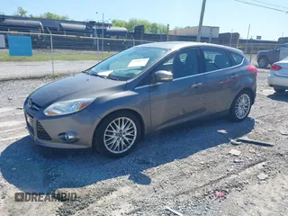 2012 Ford Focus SEL with VIN 1FAHP3M27CL399204, listed as a IAAI auction lot 41980976 with 113,443 mi miles. Bid and sale history available at carsss.com. Image 2.