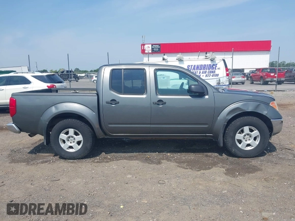 2005 Nissan Frontier LE with VIN 1N6AD07W35C438405, listed as a IAAI auction lot 42469804 with 128,472 mi miles and . Bid and sale history available at DreamBid. Image 14.