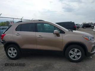 2018 Chevrolet Trax LT with VIN 3GNCJPSB5JL302011, listed as a IAAI auction lot 42177288 with 71,553 mi miles and . Bid and sale history available at carsss.com. Image 14.