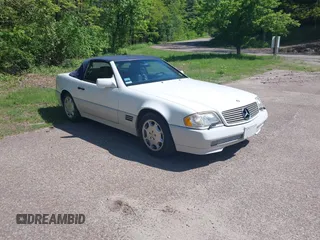 1994 Mercedes-Benz SL 5.0L z VIN WDBFA67E9RF096490, wystawiony jako IAAI lot #42377045 z przebiegiem 102 846 mil mil oraz . Historia ofert i sprzedaży dostępna na DreamBid. Obrazek 1.