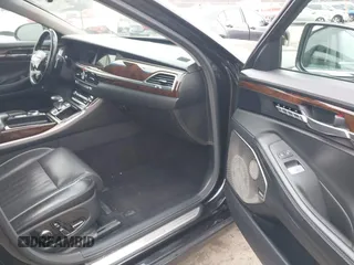2018 Genesis G90 3.3T Premium with VIN KMHG34JA7JU041008, listed as a IAAI auction lot 41719369 with 146,874 mi miles. Bid and sale history available at carsss.com. Image 5.