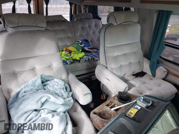 1992 Ford Econoline Cargo with VIN 1FDEE14NXNHA02328, listed as a IAAI auction lot 41637970 with Not Provided miles and . Bid and sale history available at carsss.com. Image 8.