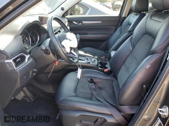 2017 Mazda CX-5 Touring with VIN JM3KFACLXH0131443, listed as a Copart auction lot 48524845 with 102,731 mi miles and Salvage Title. Bid and sale history available at carsss.com. Image 7.