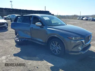 2024 Mazda CX-5 2.5 Turbo Signature with VIN JM3KFBXY4R0357622, listed as a IAAI auction lot 41983547 with 3,238 mi miles. Bid and sale history available at carsss.com. Image 1.