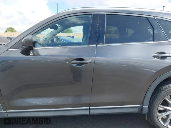 2021 Mazda CX-5 Grand Touring with VIN JM3KFADM2M1340669, listed as a IAAI auction lot 41916687 with 83,872 mi miles. Bid and sale history available at carsss.com. Image 15.