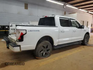 2023 Ford F-150 Lightning Pro with VIN 1FTVW1EL1PWG05889, listed as a Copart auction lot 48022435 with 20,904 mi miles and Salvage Title. Bid and sale history available at DreamBid. Image 3.
