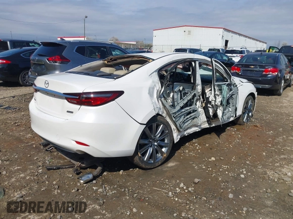 2018 Mazda 6 Touring with VIN JM1GL1VM4J1304368, listed as a IAAI auction lot 41690075 with 81,358 mi miles and . Bid and sale history available at DreamBid. Image 4.