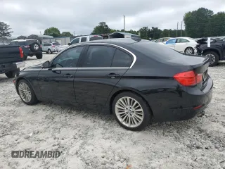 2014 BMW 3 Series 328i with VIN WBA3A5G54ENP31997, listed as a Copart auction lot 60720765 with 107,183 mi miles and Salvage title. Bid and sale history available at DreamBid. Image 2.