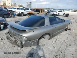 1999 Pontiac Firebird Formula with VIN 2G2FV22G2X2233618, listed as a Copart auction lot 82895584 with 0 mi miles and Salvage Title. Bid and sale history available at carsss.com. Image 3.