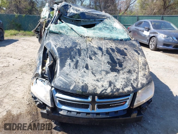 2013 Dodge Avenger SE with VIN 1C3CDZAB7DN580897, listed as a IAAI auction lot 41988683 with Not Provided miles and . Bid and sale history available at carsss.com. Image 13.