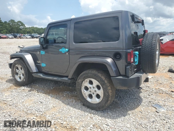 2014 Jeep Wrangler Sahara with VIN 1C4AJWBG8EL248291, listed as a Copart auction lot 60611345 with 84,777 mi miles and Salvage title. Bid and sale history available at DreamBid. Image 2.