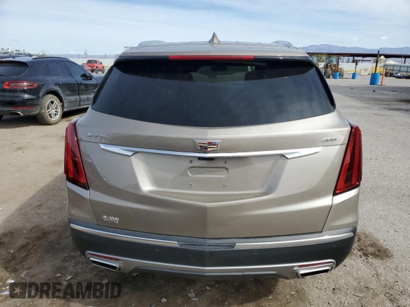 2022 Cadillac XT5 FWD Premium Luxury z VIN 1GYKNCRS9NZ180043, wystawiony jako Copart lot #51352195 z przebiegiem 12 399 mil mil oraz Szkoda całkowita • Salvage title. Historia ofert i sprzedaży dostępna na DreamBid. Obrazek 6.