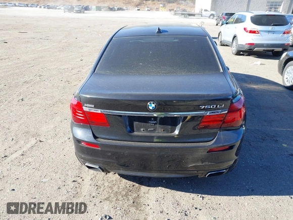 2015 BMW 7 Series 750Li xDrive with VIN WBAYF8C56FD654698, listed as a IAAI auction lot 41229313 with 120,238 mi miles and . Bid and sale history available at carsss.com. Image 16.