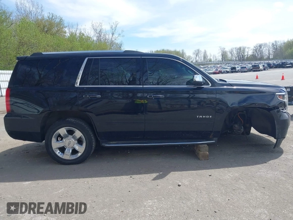 2015 Chevrolet Tahoe LTZ with VIN 1GNSKCKC8FR514671, listed as a IAAI auction lot 42157084 with 182,665 mi miles and . Bid and sale history available at DreamBid. Image 13.