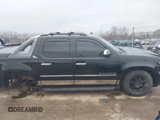 2011 Chevrolet Avalanche LTZ with VIN 3GNTKGE33BG111277, listed as a IAAI auction lot 42123375 with 209,024 mi miles. Bid and sale history available at carsss.com. Image 13.