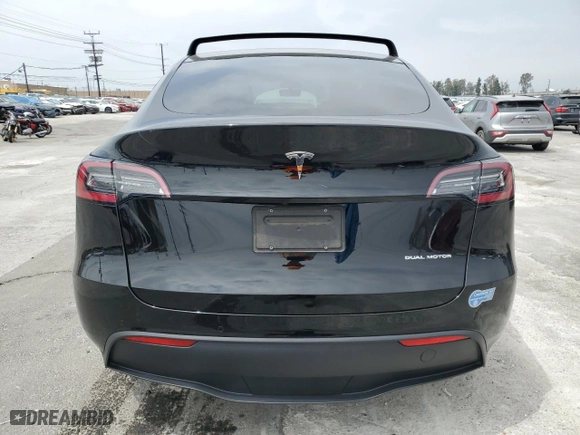 2020 Tesla Model Y Long Range with VIN 5YJYGDEE9LF020148, listed as a Copart auction lot 52031145 with 26,656 mi miles and Salvage Title. Bid and sale history available at carsss.com. Image 6.