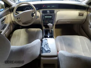 2000 Toyota Avalon XL with VIN 4T1BF28B1YU033159, listed as a Copart auction lot 52796755 with 247,062 mi miles and Salvage Title. Bid and sale history available at DreamBid. Image 8.