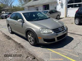 2009 Volkswagen Jetta z VIN 3VWJL71K59M084442, wystawiony jako Copart lot #56187035 z przebiegiem 243 698 mil mil oraz Czysty tytuł • Clean title. Historia ofert i sprzedaży dostępna na DreamBid. Obrazek 1.
