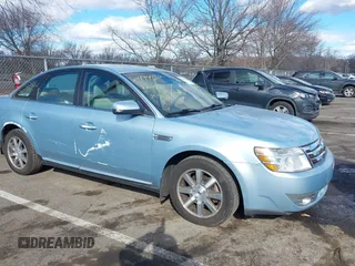 2008 Ford Taurus SEL with VIN 1FAHP27WX8G157077, listed as a IAAI auction lot 41499882 with 113,039 mi miles. Bid and sale history available at carsss.com. Image 6.