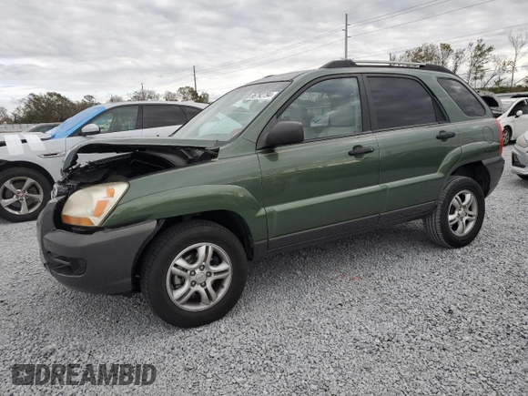 2005 Kia Sportage LX with VIN KNDJF723657074234, listed as a Copart auction lot 86792794 with 97,548 mi miles and Salvage Title. Bid and sale history available at carsss.com. Image 1.