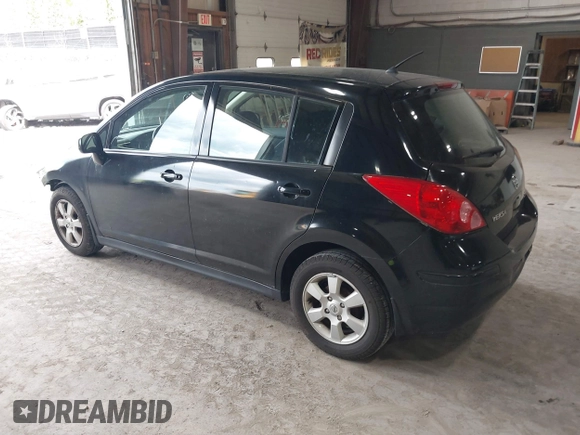 2009 Nissan Versa 1.8 S with VIN 3N1BC13E79L394807, listed as a IAAI auction lot 42198905 with 77,245 mi miles. Bid and sale history available at carsss.com. Image 3.