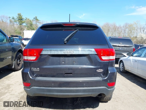 2013 Jeep Grand Cherokee Laredo with VIN 1C4RJFAG1DC592371, listed as a IAAI auction lot 42064993 with 136,154 mi miles. Bid and sale history available at carsss.com. Image 16.