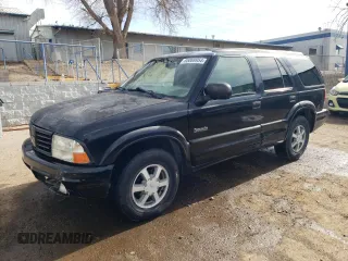 2000 Oldsmobile Bravada z VIN 1GHDT13W3Y2178106, wystawiony jako Copart lot #85069954 z przebiegiem 211 164 mil mil oraz Szkody całkowita. Historia ofert i sprzedaży dostępna na DreamBid. Obrazek 1.
