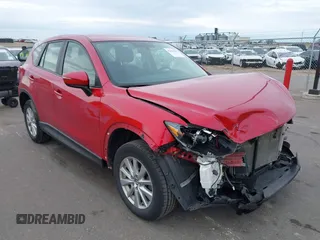 2016 Mazda CX-5 Sport z VIN JM3KE2BY8G0886207, wystawiony jako IAAI lot #42114358 z przebiegiem 93 010 mil mil oraz . Historia ofert i sprzedaży dostępna na DreamBid. Obrazek 1.