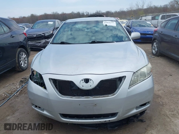 2009 Toyota Camry with VIN 4T1BE46K19U392840, listed as a IAAI auction lot 42056237 with 210,221 mi miles. Bid and sale history available at carsss.com. Image 13.