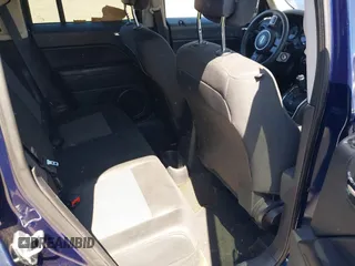2014 Jeep Patriot Altitude z VIN 1C4NJPBA0ED585356, wystawiony jako IAAI lot #41601154 z przebiegiem 169 333 mil mil oraz . Historia ofert i sprzedaży dostępna na DreamBid. Obrazek 8.
