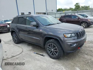 2017 Jeep Grand Cherokee Trailhawk with VIN 1C4RJFLG1HC821666, listed as a Copart auction lot 58711535 with 109,578 mi miles and Salvage title. Bid and sale history available at DreamBid. Image 4.