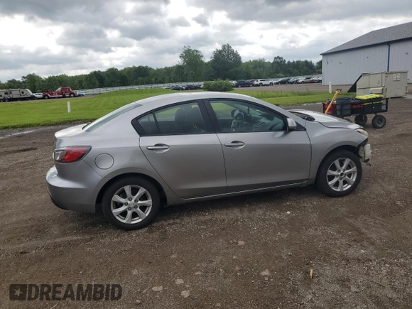 2011 Mazda 3 i Touring with VIN JM1BL1VF3B1491700, listed as a Copart auction lot 61573885 with 145,626 mi miles and Salvage title. Bid and sale history available at DreamBid. Image 3.
