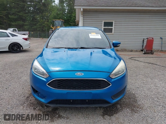 2015 Ford Focus SE z VIN 1FADP3F21FL274182, wystawiony jako IAAI lot #42441161 z przebiegiem 176 810 mil mil oraz . Historia ofert i sprzedaży dostępna na DreamBid. Obrazek 13.