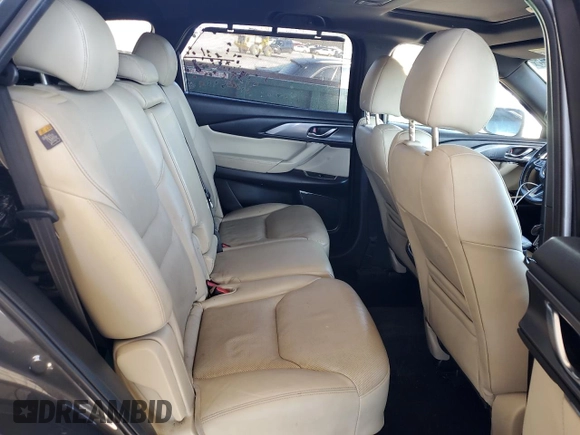 2018 Mazda CX-9 Grand Touring z VIN JM3TCADY6J0210136, wystawiony jako Copart lot #43649245 z przebiegiem 145 921 mil mil oraz Czysty tytuł • Clean title. Historia ofert i sprzedaży dostępna na DreamBid. Obrazek 10.