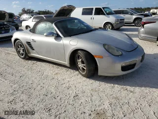 2007 Porsche Boxster with VIN WP0CA29867U711901, listed as a Copart auction lot 77470004 with 0 mi miles and Salvage Title. Bid and sale history available at carsss.com. Image 4.
