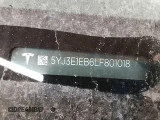 2020 Tesla Model 3 Long Range z VIN 5YJ3E1EB6LF801018, wystawiony jako IAAI lot #42566083 z przebiegiem 33 331 mil mil oraz . Historia ofert i sprzedaży dostępna na DreamBid. Obrazek 1.