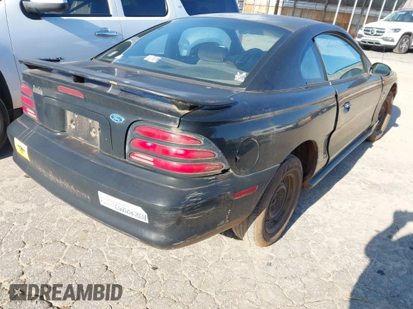 1995 Ford Mustang with VIN 1FALP4042SF278701, listed as a IAAI auction lot 41776409 with 203,241 mi miles and . Bid and sale history available at DreamBid. Image 4.