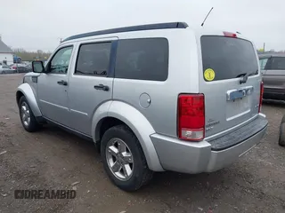 2007 Dodge Nitro SLT with VIN 1D8GU58KX7W527915, listed as a IAAI auction lot 41971181 with 167,493 mi miles. Bid and sale history available at carsss.com. Image 3.