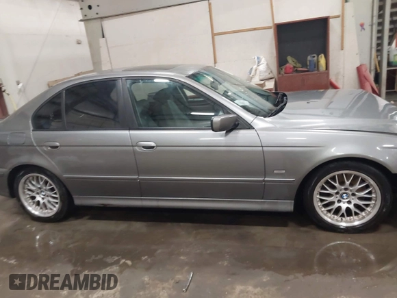 2003 BMW 5 Series 530iA with VIN WBADT63433CK45644, listed as a IAAI auction lot 41850399 with 178,600 mi miles. Bid and sale history available at carsss.com. Image 13.