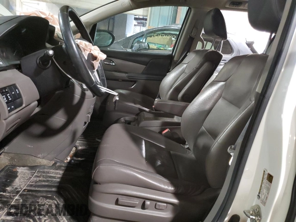 2014 Honda Odyssey Touring with VIN 5FNRL5H90EB137575, listed as a Copart auction lot 54606535 with 168,714 mi miles and Salvage title. Bid and sale history available at DreamBid. Image 7.